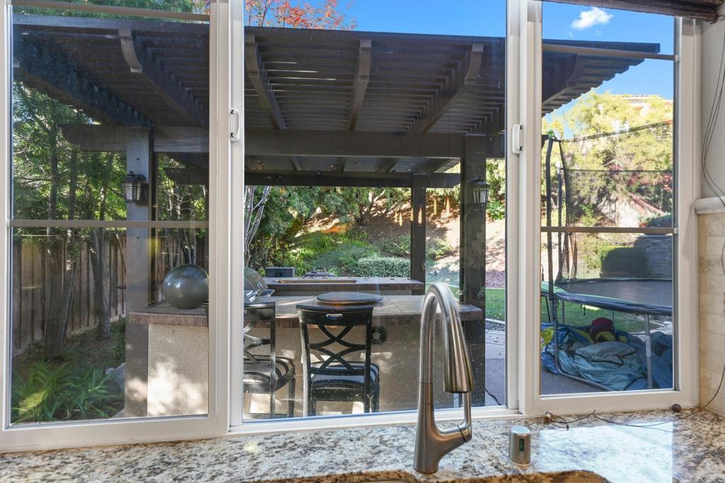 3524 North Fork Avenue Carlsbad, CA 92010 - Photo 11 of 37 a glass window with an outdoor space