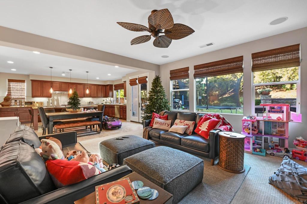 3524 North Fork Avenue Carlsbad, CA 92010 - Photo 15 of 37 a living room with furniture and a large window