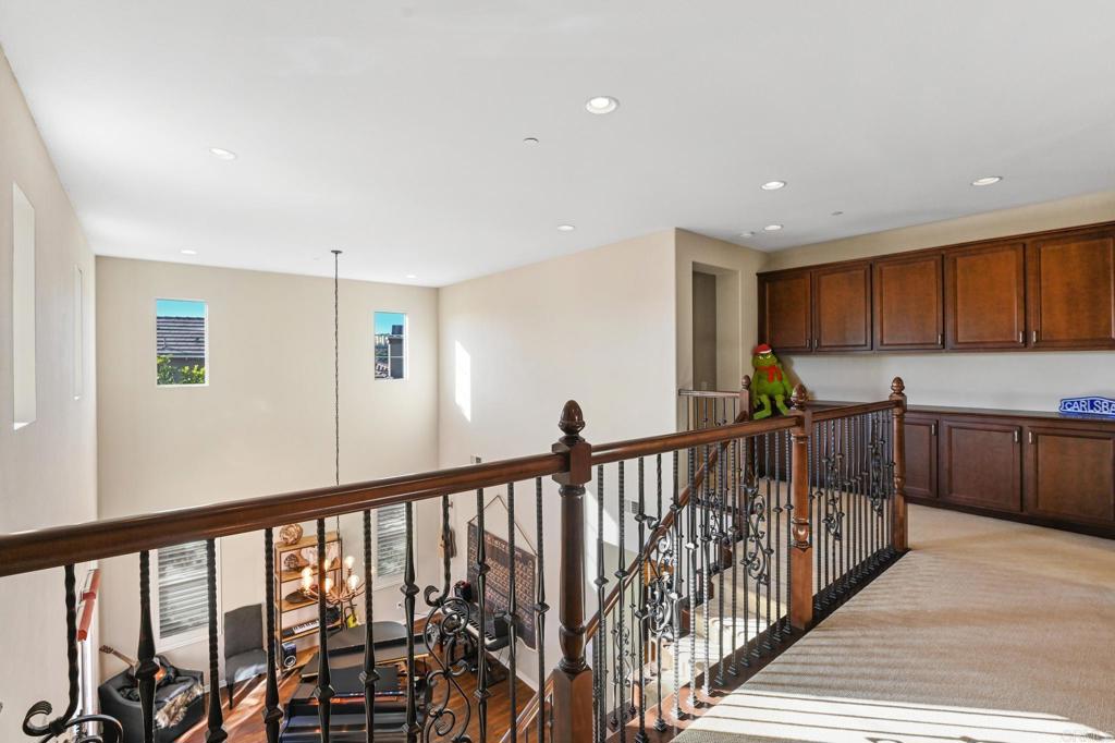 3524 North Fork Avenue Carlsbad, CA 92010 - Photo 19 of 37 a view of a kitchen with wooden floor and outdoor space