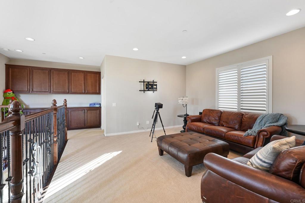 3524 North Fork Avenue Carlsbad, CA 92010 - Photo 21 of 37 a living room with furniture and a window