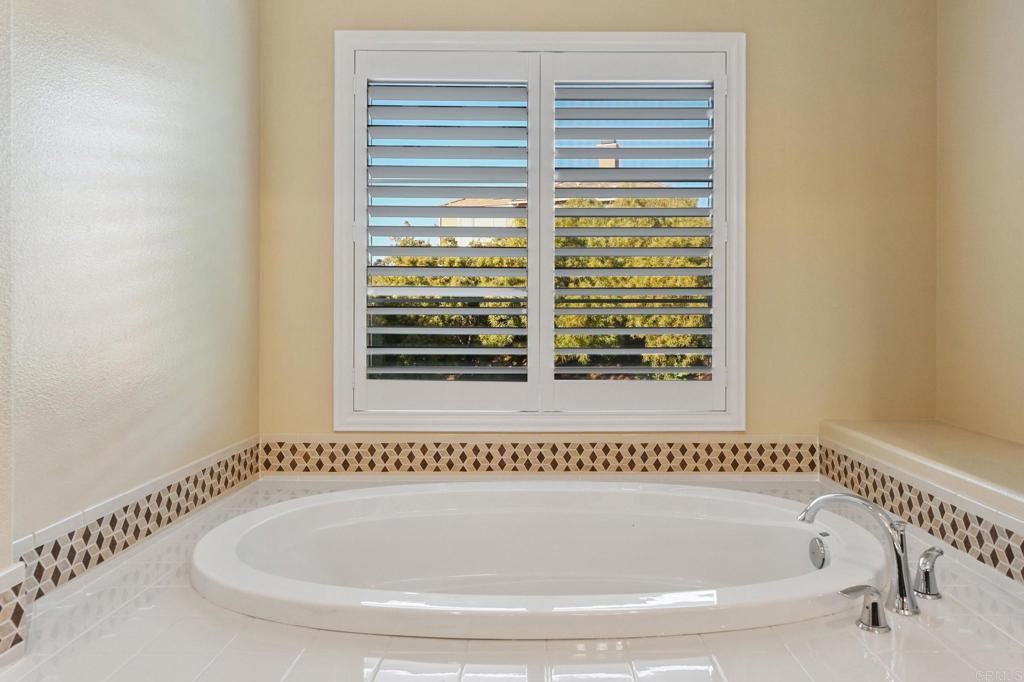 3524 North Fork Avenue Carlsbad, CA 92010 - Photo 25 of 37 a bath tub sitting next to a window