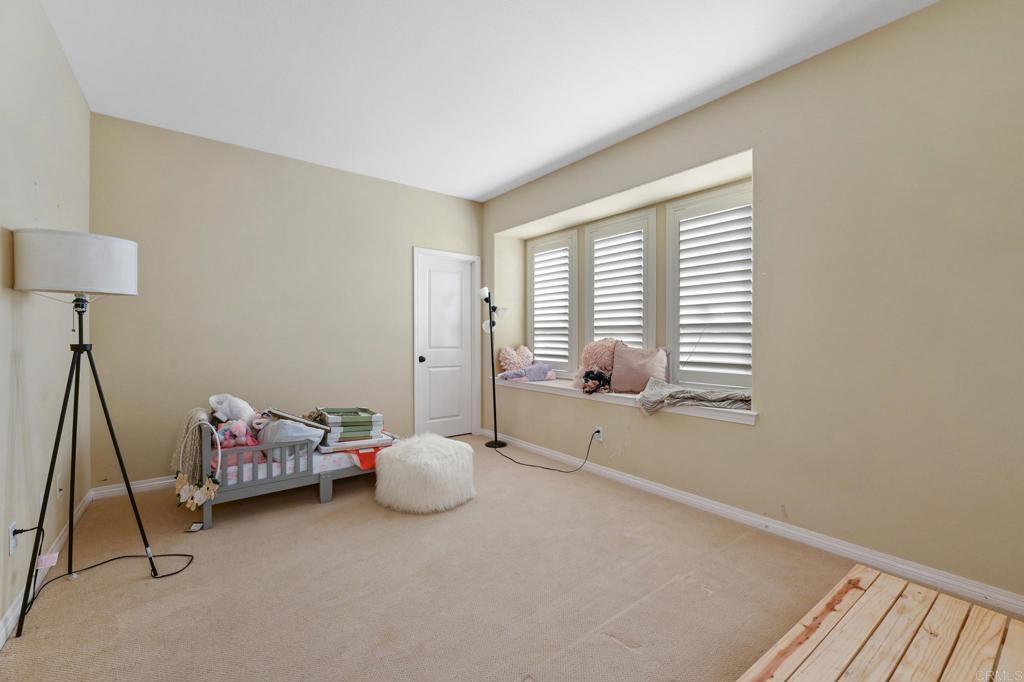 3524 North Fork Avenue Carlsbad, CA 92010 - Photo 26 of 37 a bedroom with furniture and a window