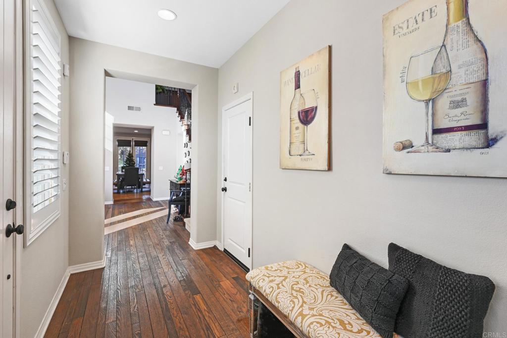 3524 North Fork Avenue Carlsbad, CA 92010 - Photo 4 of 37 a bedroom with a bed and wooden floor