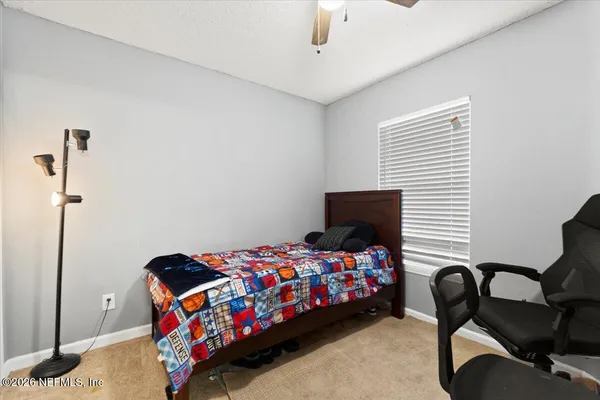 a room with furniture and flat screen tv
