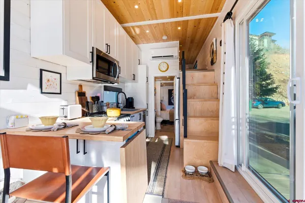 a front view of a house with wooden floor