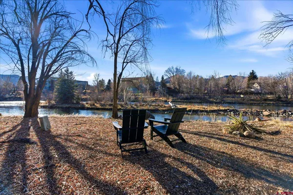 a view of a backyard with a patio