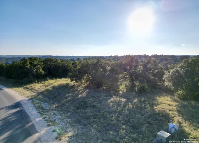 a view of a street with of trees