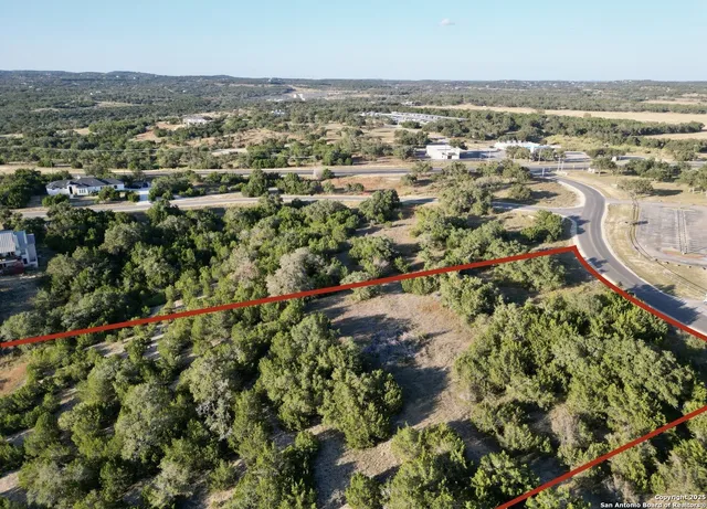 an aerial view of a city with lots of residential buildings