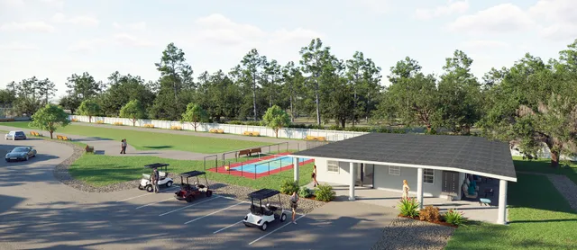 an outdoor space with furniture and garden