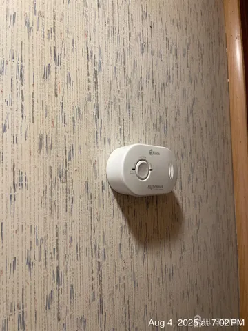 a bathroom with a shower curtain