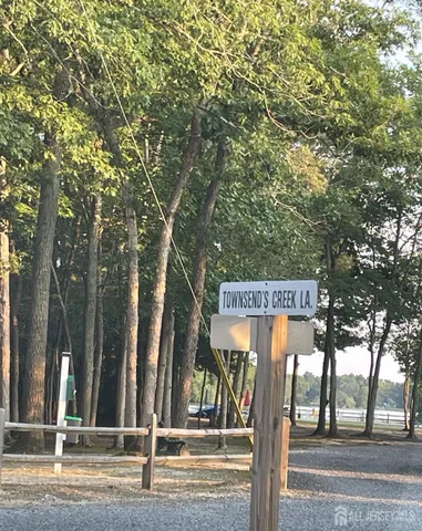 a sign on the side of a road
