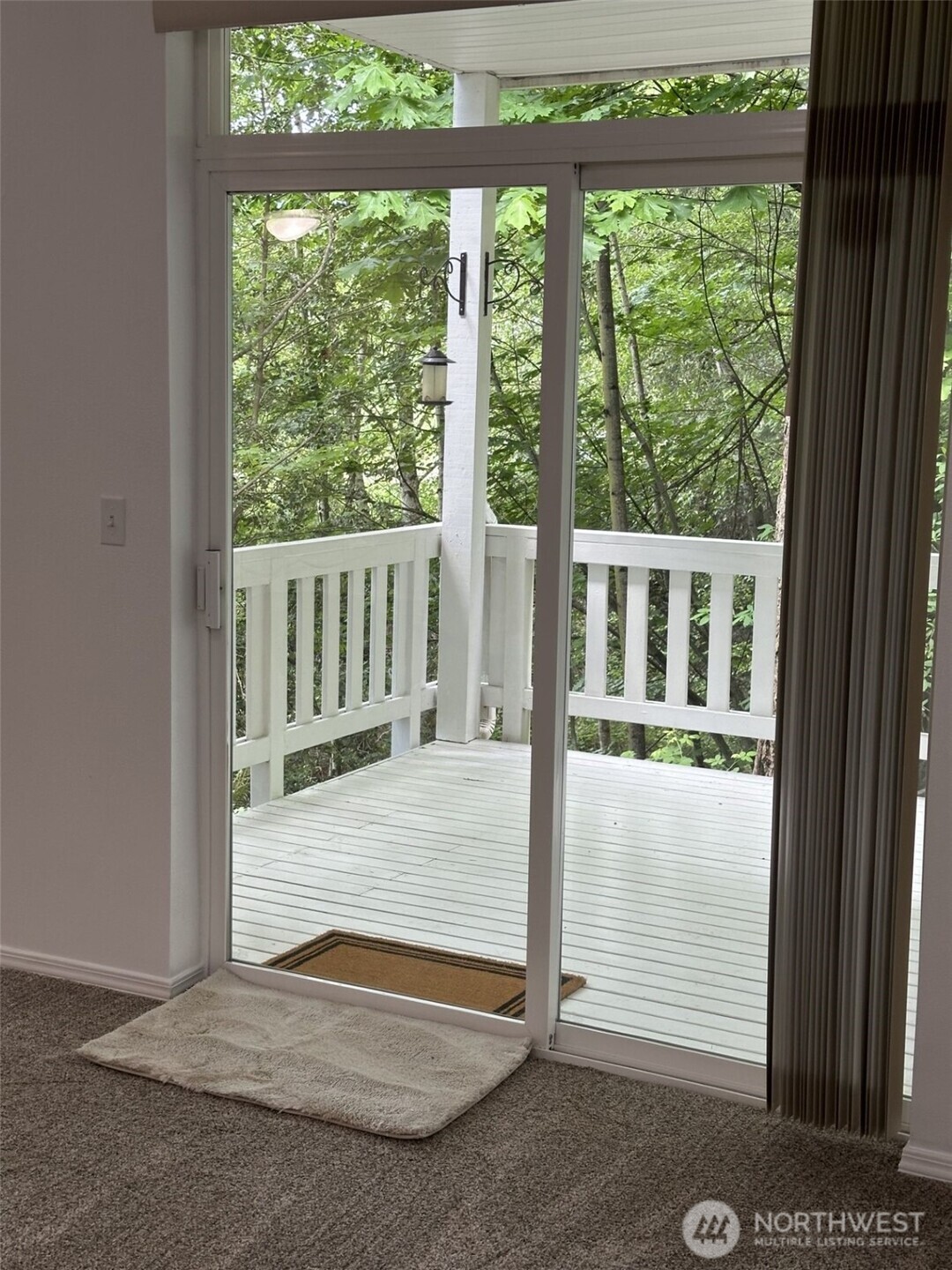 714 228th Street Southwest, Unit O101 Bothell, WA 98021 - Photo 7 of 28 a view of porch with a floor to ceiling window