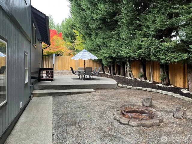 a view of a street with sitting area