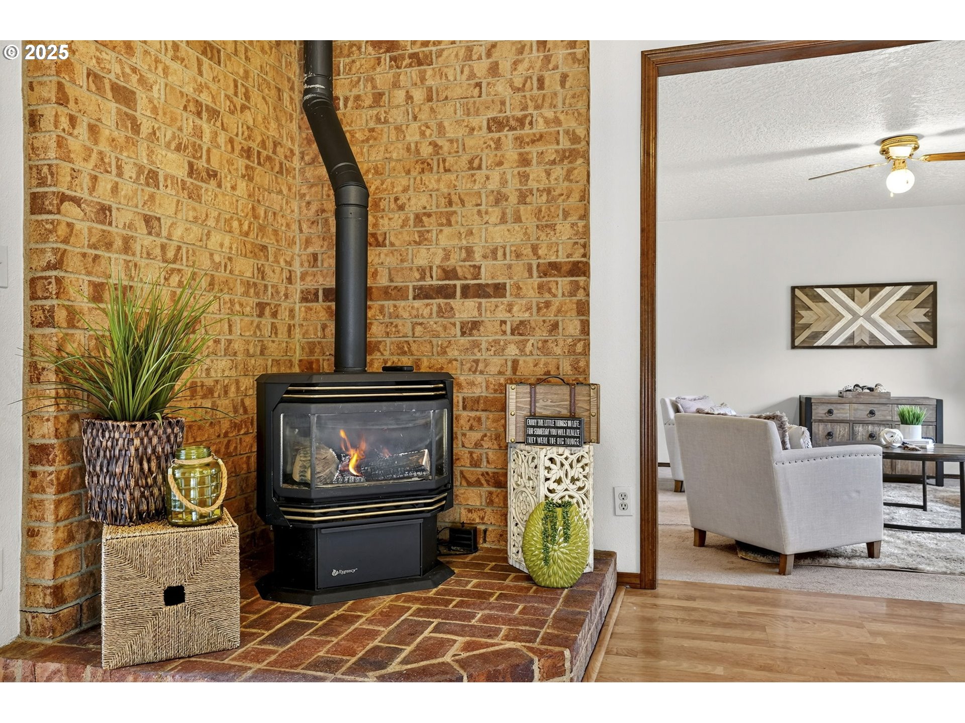 1427 Southeast Wendy Avenue Gresham, OR 97080 - Photo 12 of 35 a living room with a couch and a fireplace