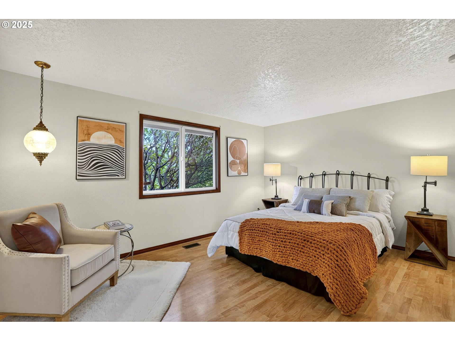 1427 Southeast Wendy Avenue Gresham, OR 97080 - Photo 17 of 35 a bedroom with a bed and a couch