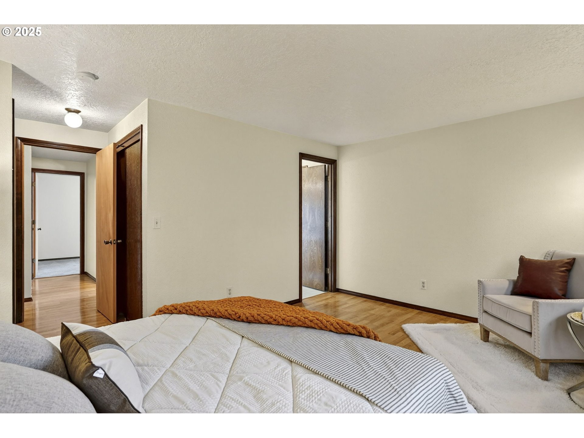 1427 Southeast Wendy Avenue Gresham, OR 97080 - Photo 18 of 35 a bedroom with a bed and a couch