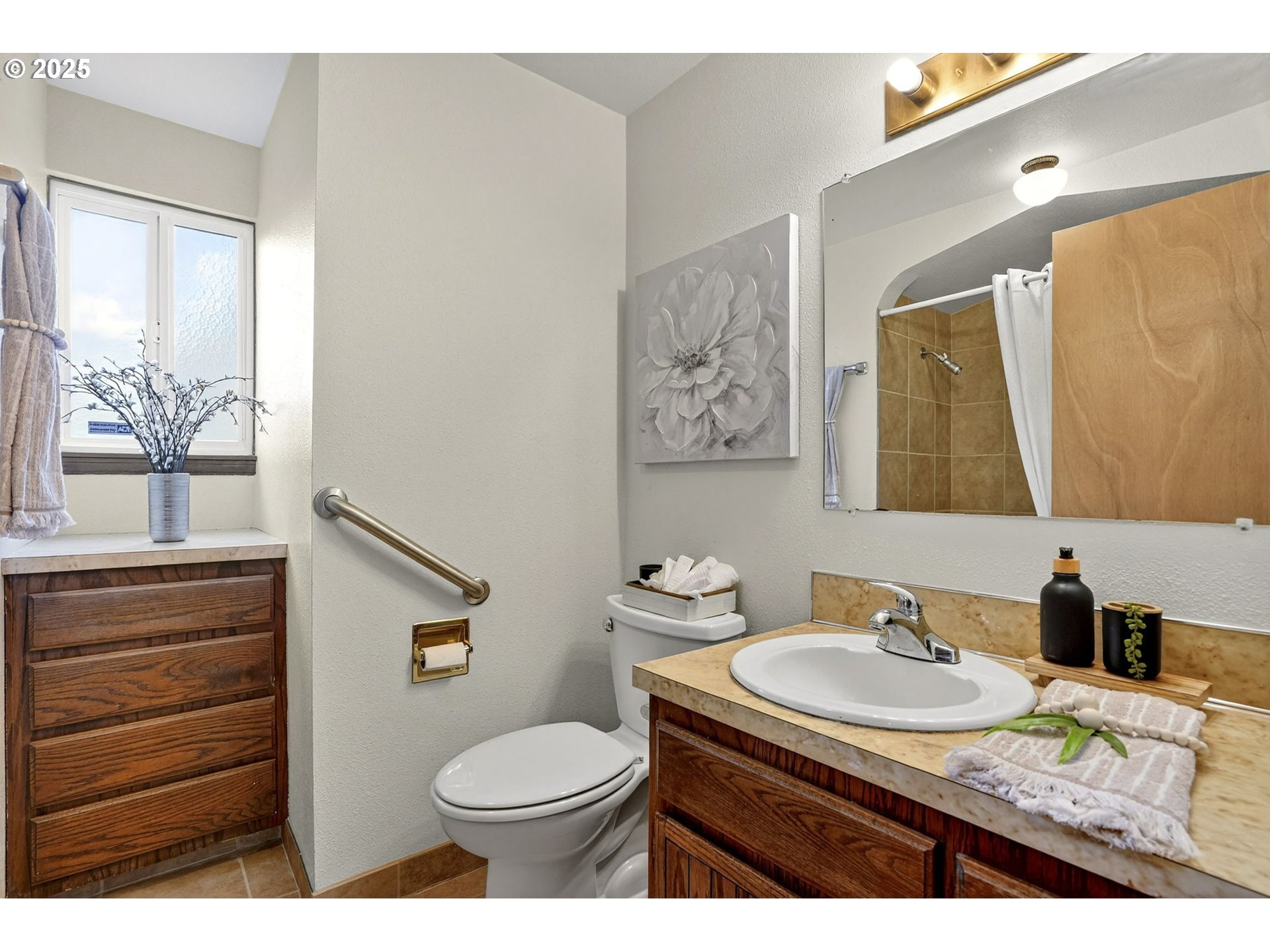 1427 Southeast Wendy Avenue Gresham, OR 97080 - Photo 24 of 35 a bathroom with a granite countertop sink toilet and a mirror