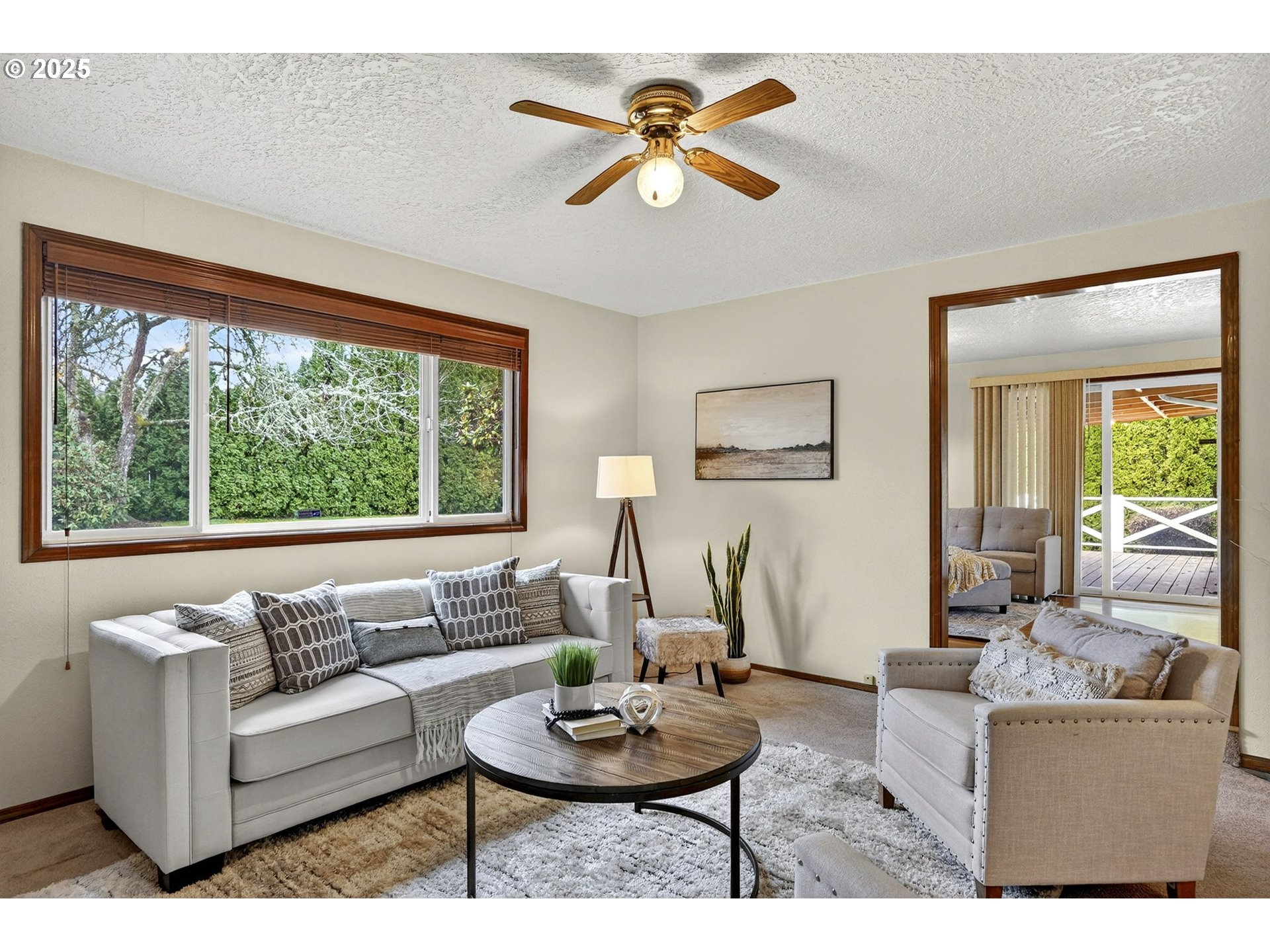 1427 Southeast Wendy Avenue Gresham, OR 97080 - Photo 8 of 35 a living room with furniture and a large window