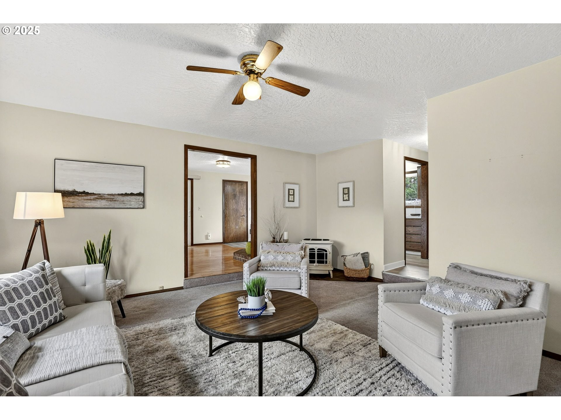 1427 Southeast Wendy Avenue Gresham, OR 97080 - Photo 9 of 35 a living room with furniture and a wooden floor