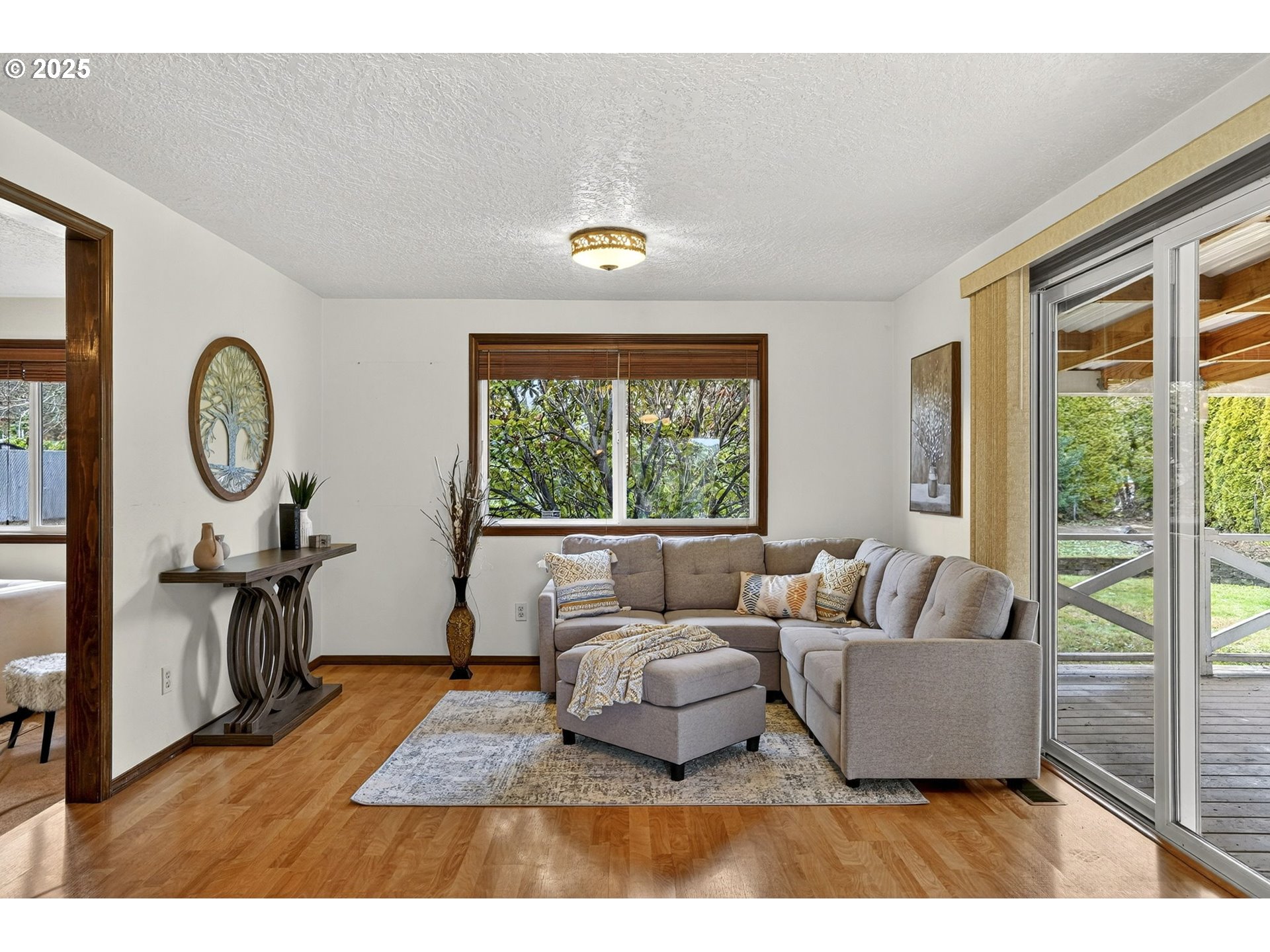 1427 Southeast Wendy Avenue Gresham, OR 97080 - Photo 10 of 35 a living room with furniture and a large window