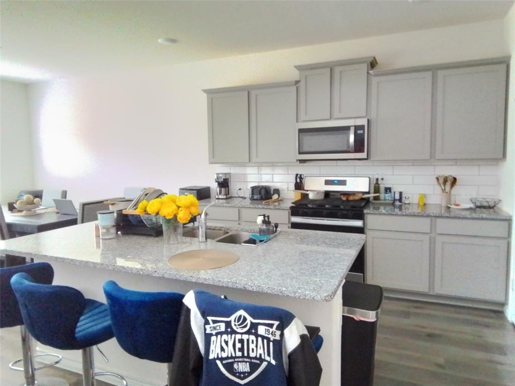 9712 Quail Pointe Road Aubrey, TX 76227 - Photo 6 of 22 With Gas Cooking