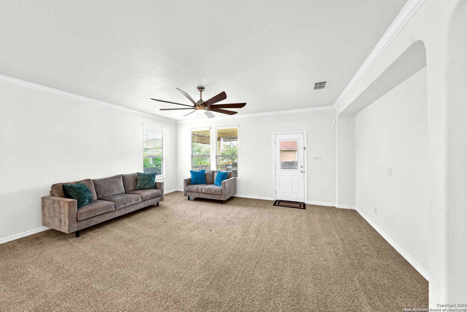 7621 Lorca Boerne, TX 78015 - Photo 13 of 46 a living room with furniture and a window