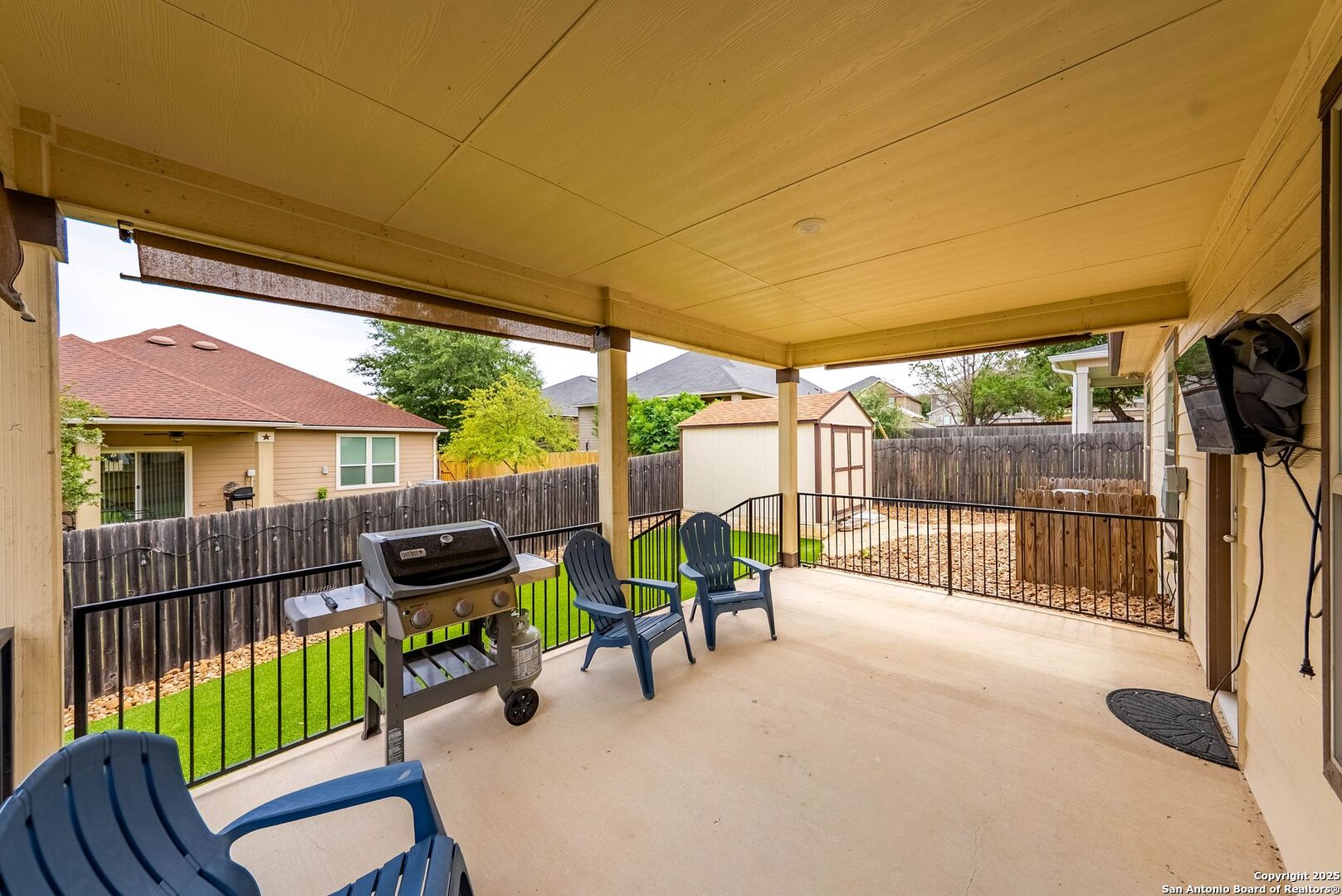 7621 Lorca Boerne, TX 78015 - Photo 44 of 46 a view of a patio with a table chairs and a backyard