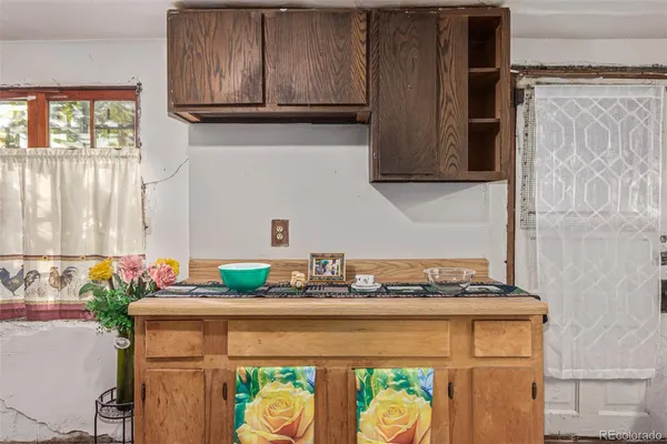 a kitchen with stainless steel appliances granite countertop a stove and a refrigerator