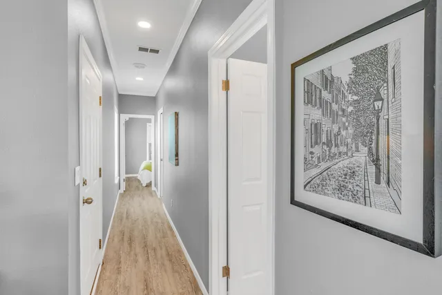 a bathroom with a sink a mirror and a shower