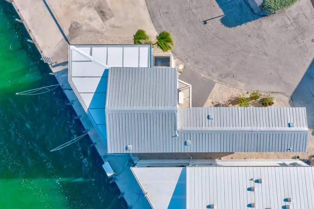 a view of yard from terrace with seating space