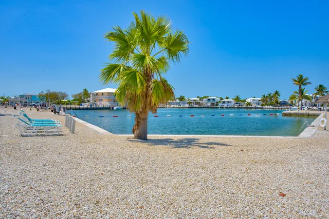 $899,000 | 701 Spanish Main Drive, Unit 97, Cudjoe, FL 33042