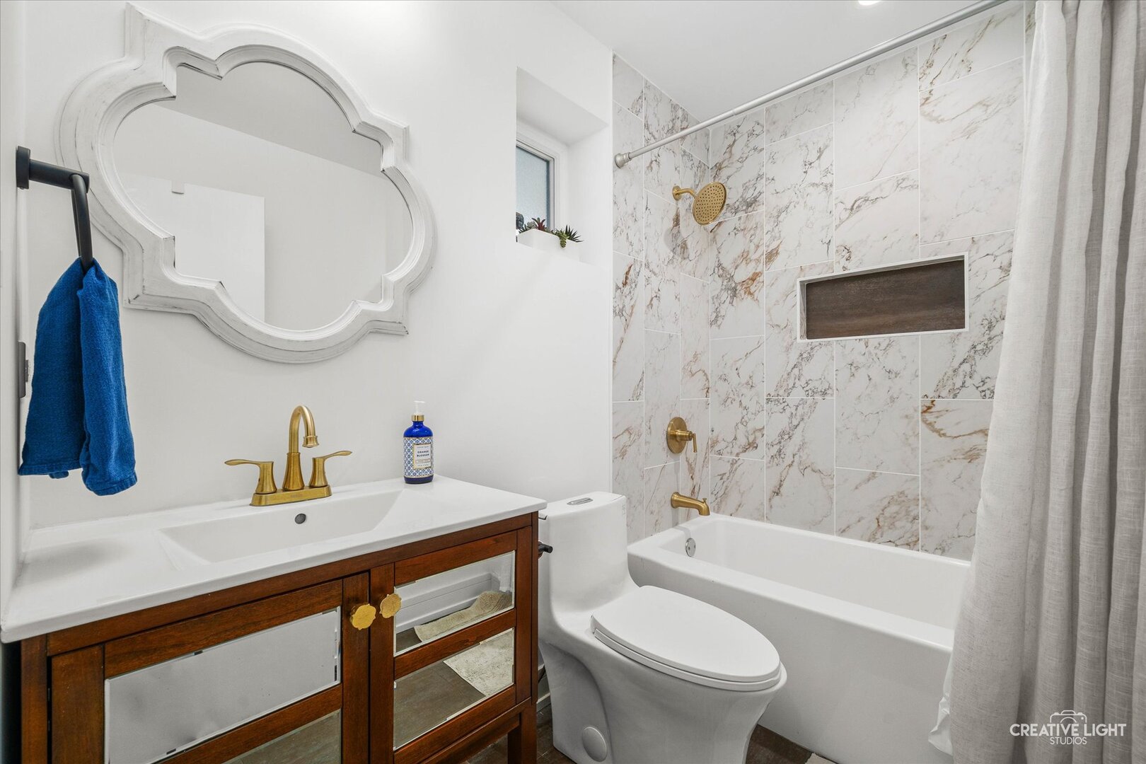 20 Forbes Road Riverside, IL 60546 - Photo 11 of 21 a bathroom with a sink a toilet and a bathtub