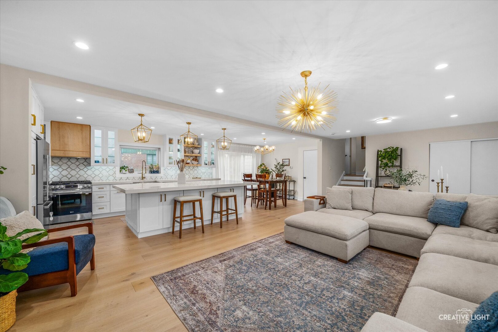 20 Forbes Road Riverside, IL 60546 - Photo 2 of 21 a living room with furniture a dining table and a fireplace
