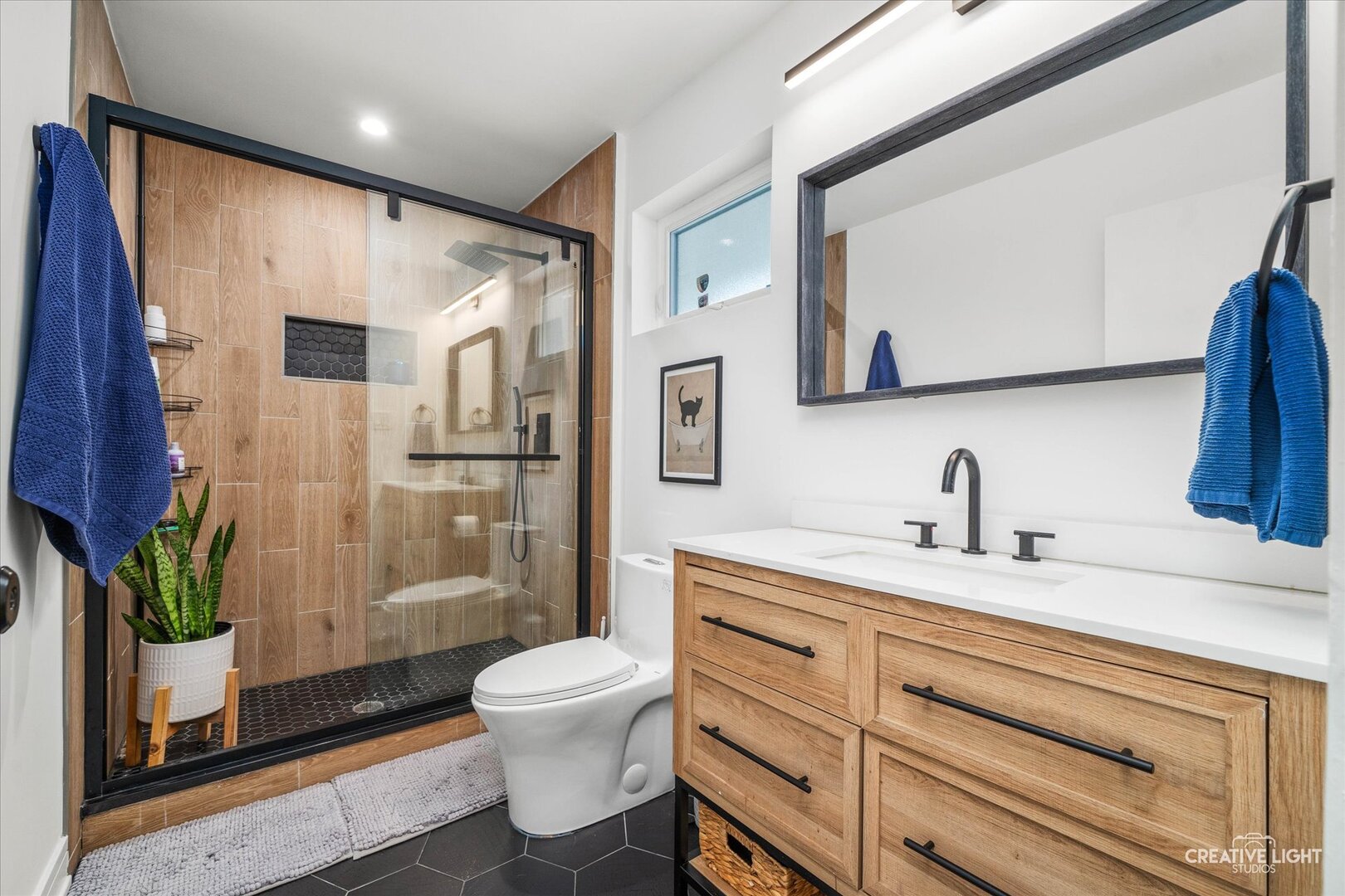 20 Forbes Road Riverside, IL 60546 - Photo 8 of 21 a bathroom with a sink a toilet and a mirror