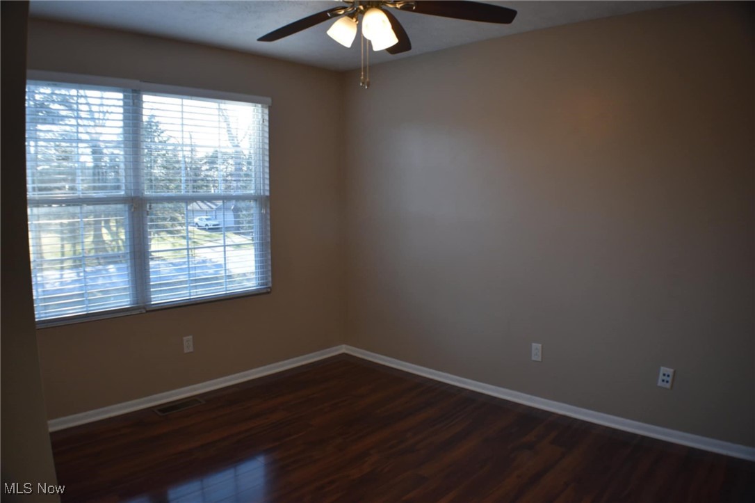 1088 Wadsworth Road Medina, OH 44256 - Photo 15 of 24 Bedroom with laminate wood flooring and ceiling fan.