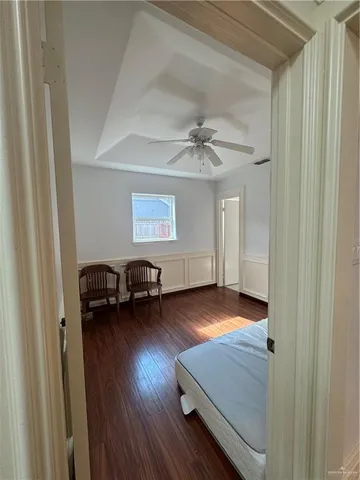 a view of livingroom with furniture and hardwood floor