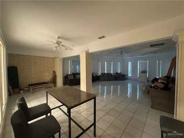 a living room with furniture and a couch