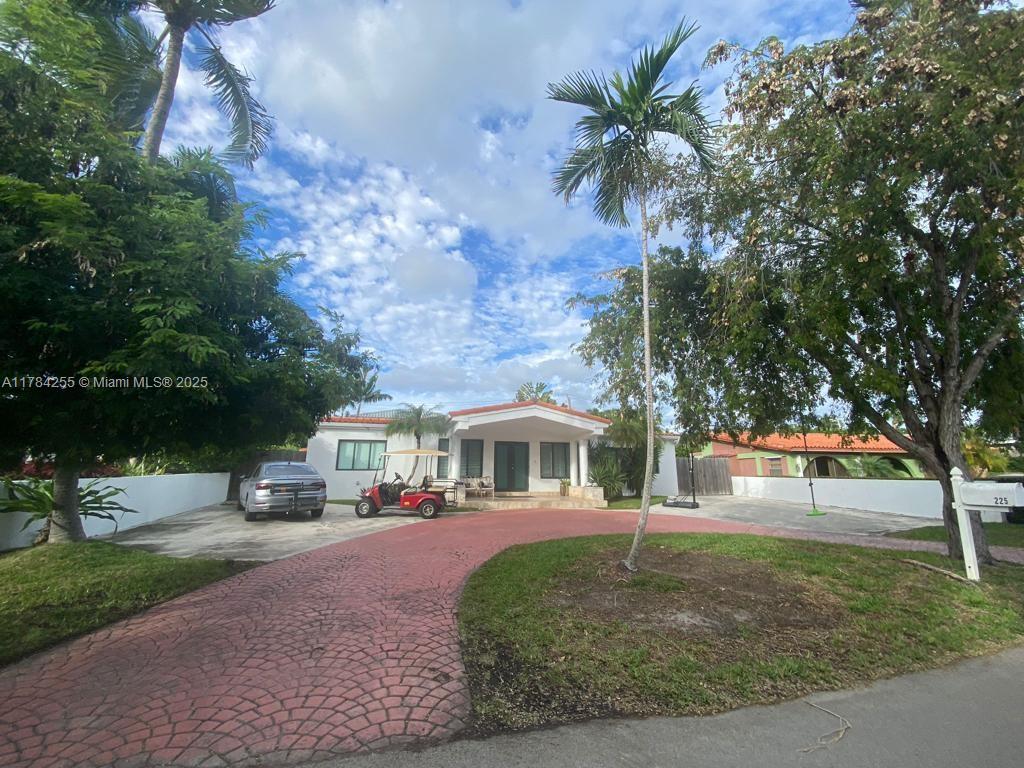 Tropical Isle Homes Key Biscayne, FL 33149 - Photo 12 of 38 a view of house with outdoor space and entertaining space