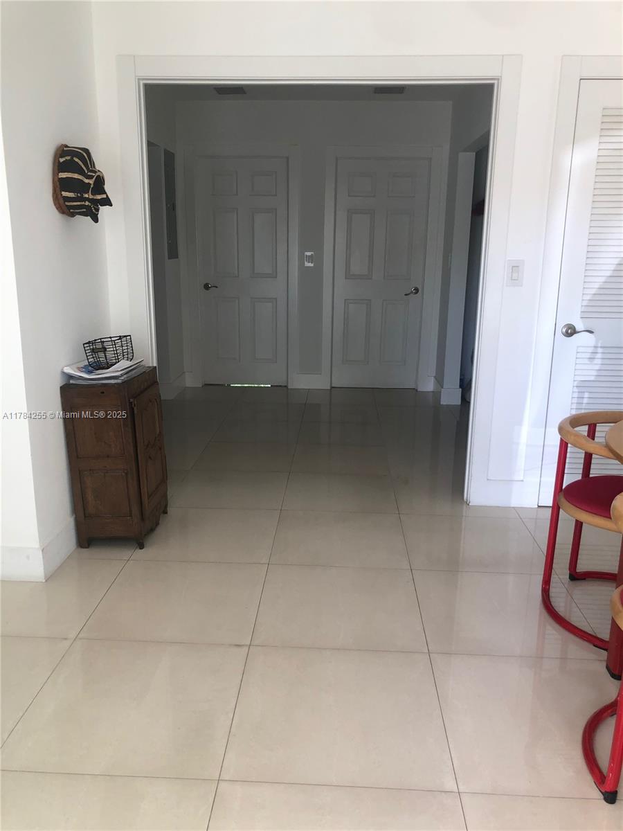 Tropical Isle Homes Key Biscayne, FL 33149 - Photo 32 of 38 a view of an empty room