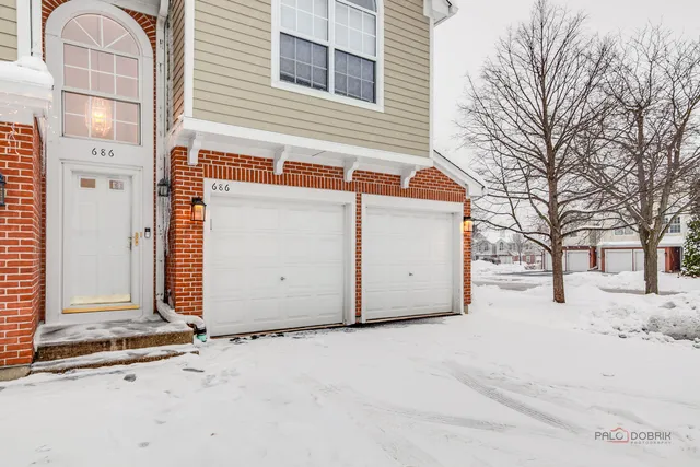 a view of a house with a snow