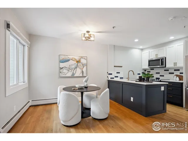a kitchen with sink cabinets and window