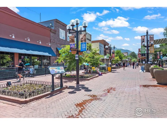 a building outdoor space with lots of potted plants