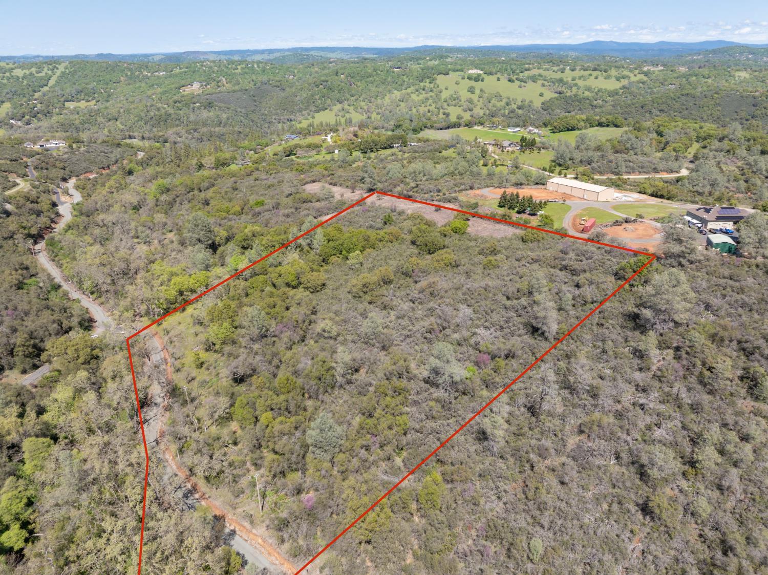 8 Jurgens Road Rescue, CA 95672 - Photo 37 of 42 a view of a field with mountains in the background