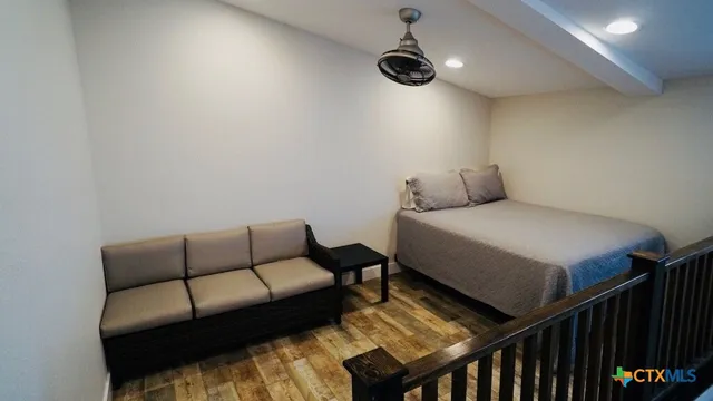 a kitchen with a refrigerator and a stove