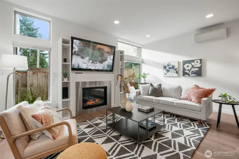 a living room with furniture and a table