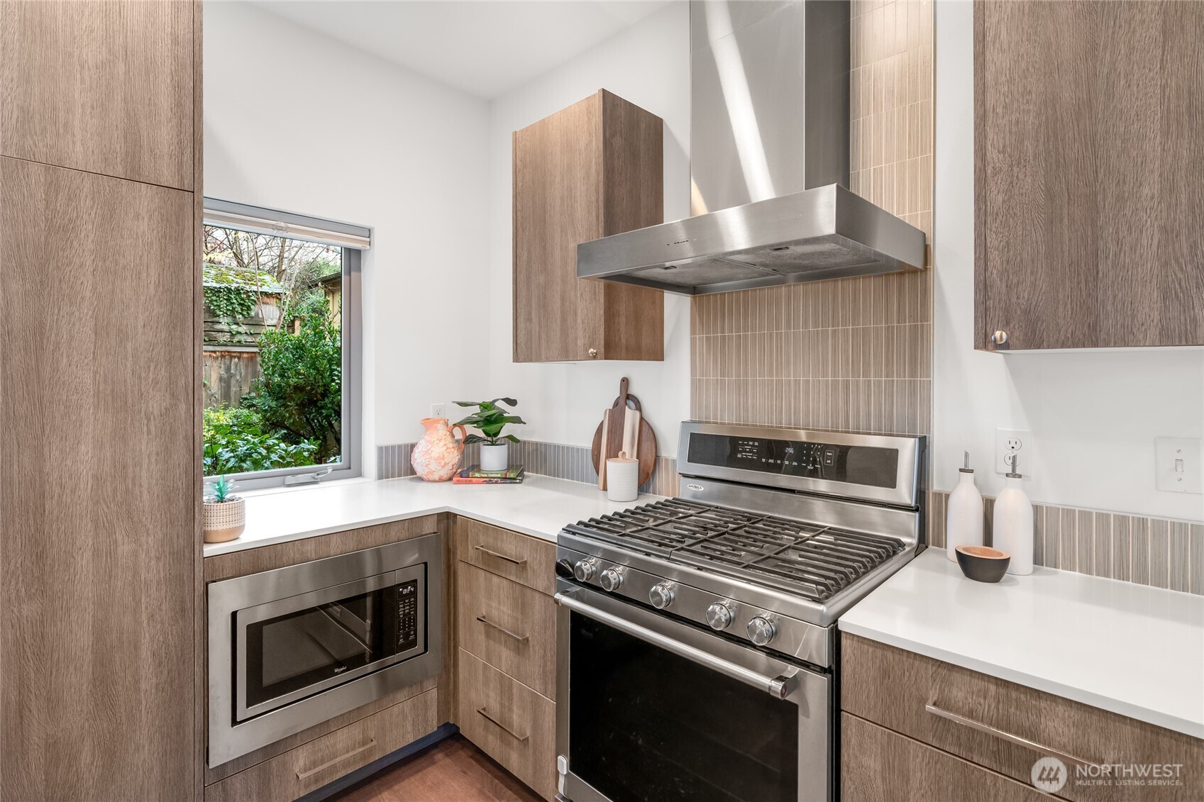 730 25th Avenue South Seattle, WA 98144 - Photo 7 of 38 a white stove top oven sitting inside of a kitchen