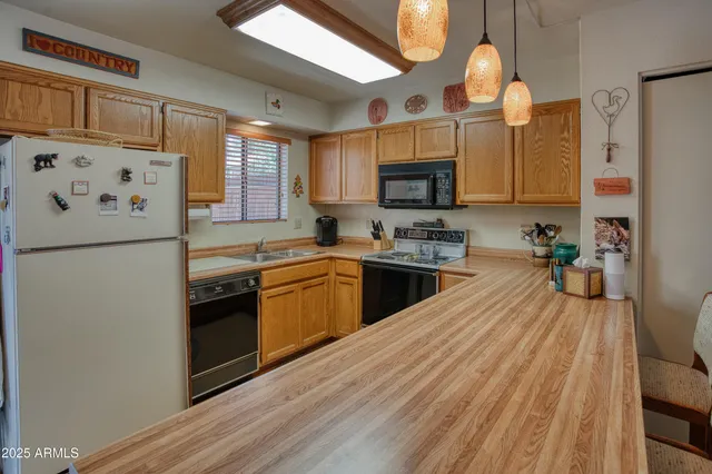 a large room with lots of furniture and a view of living room