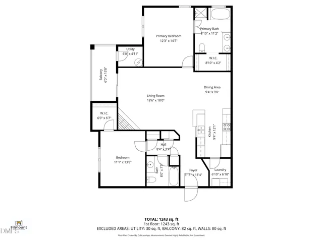 a front view of a house with a yard and lake view