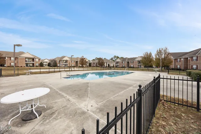 a view of a balcony with a floor to ceiling window