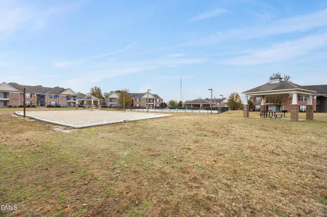 a terrace with outdoor seating and city view